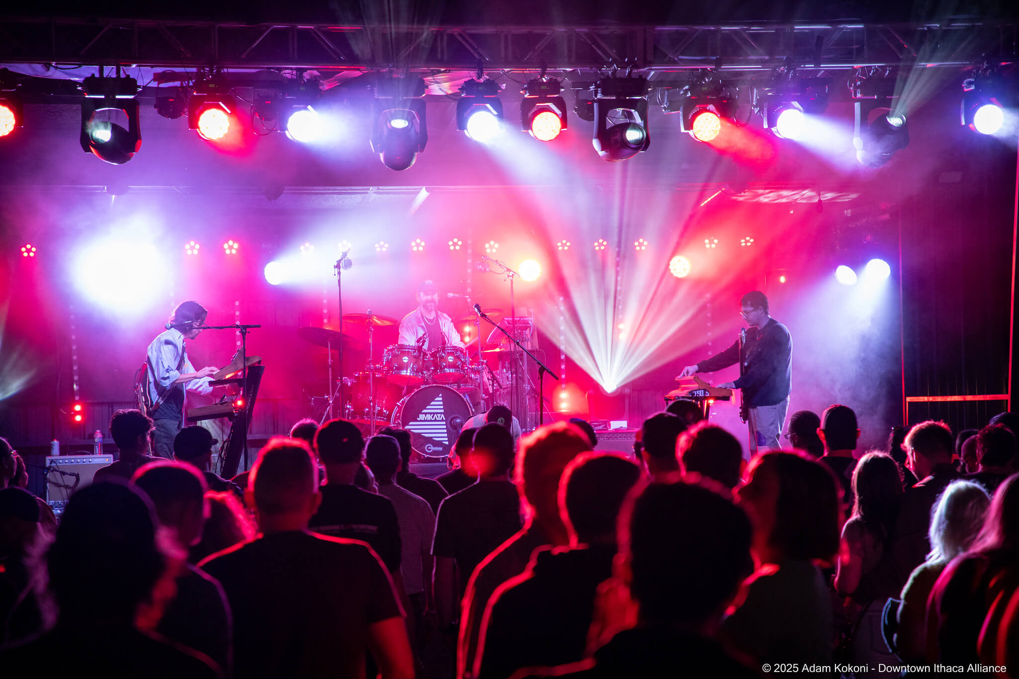 Downtown Ithaca concert crowd and stage lights