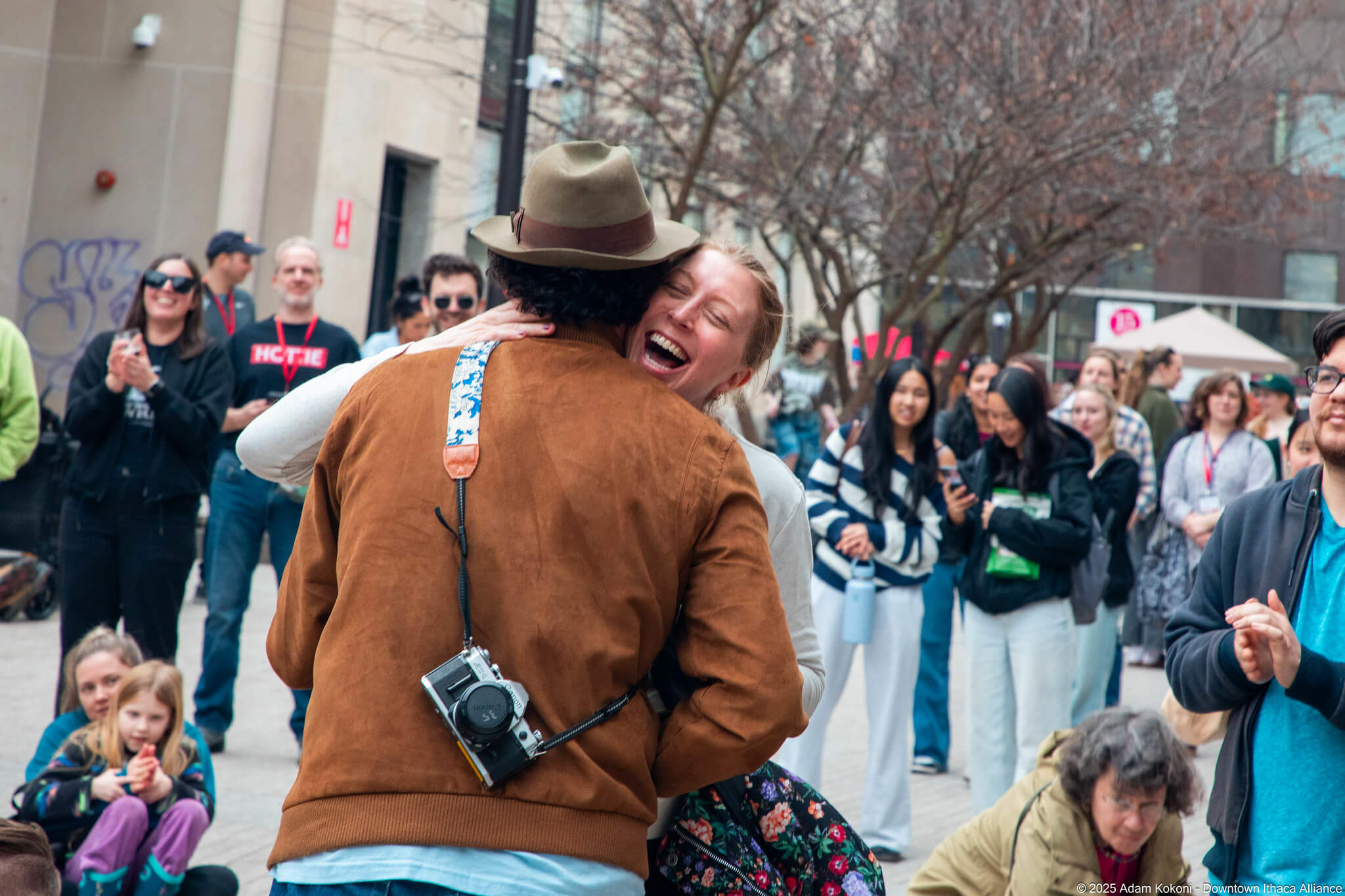 Street performer entertaining a Downtown Ithaca crowd