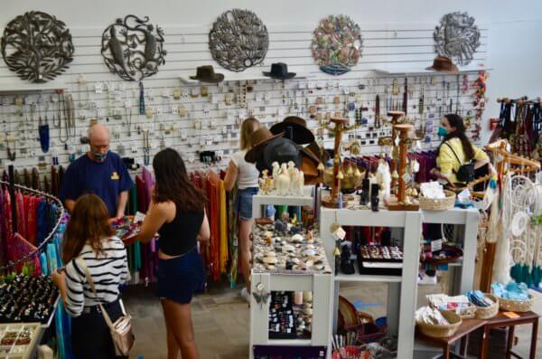 customers looking at items inside of One World Market