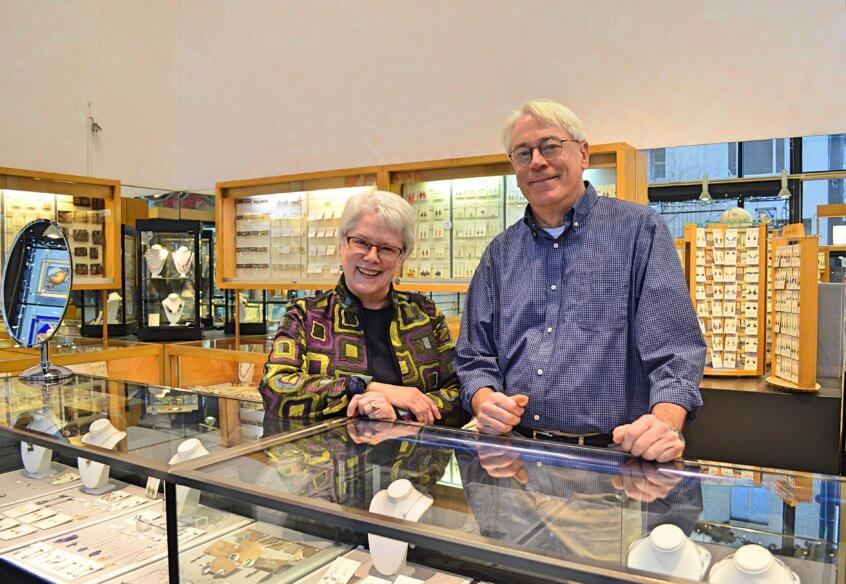 Bettsie Park and Ken Jupiter standing together in their gift shop