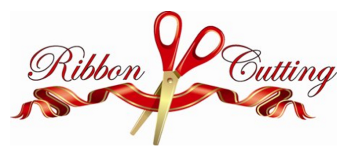 Red Ribbon and giant scissors with red handle and gold blades.