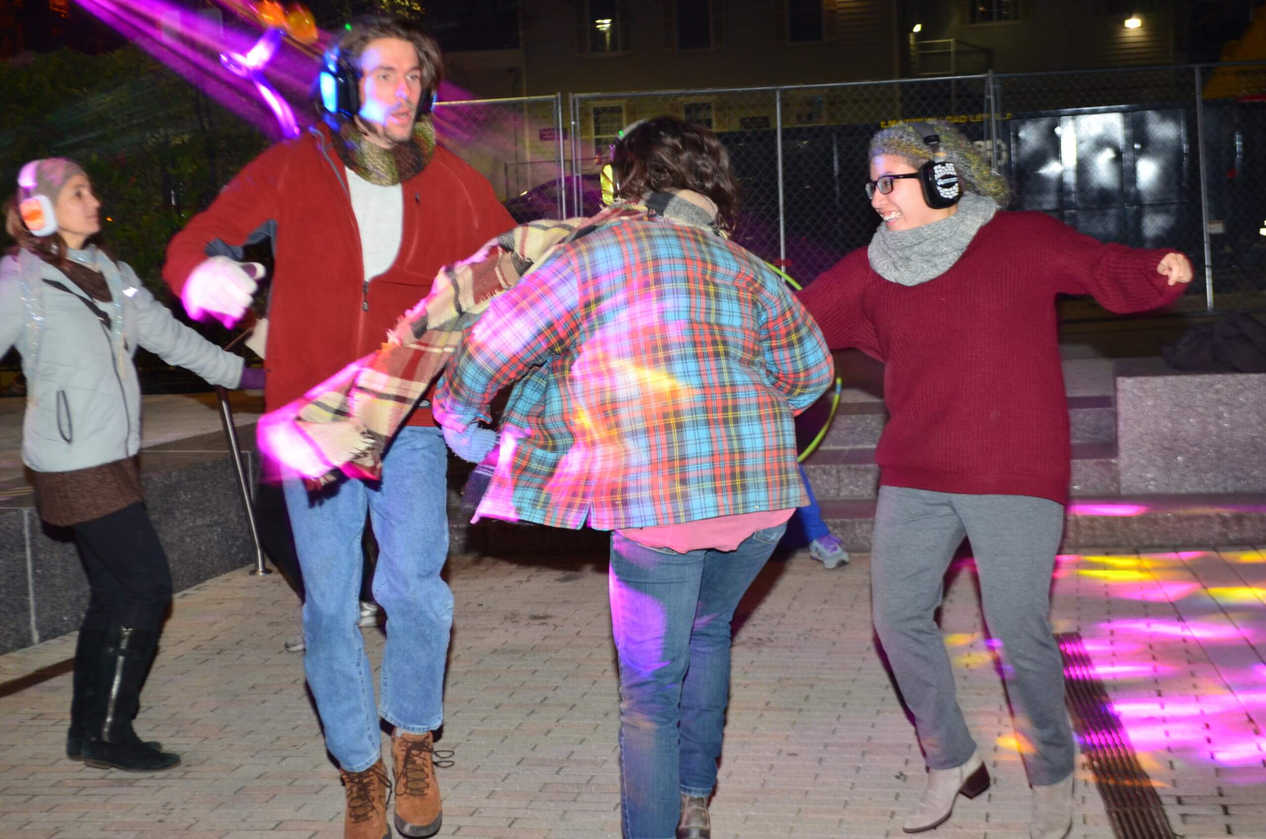 People dancing to the silent disco at the old Winter Lights Festival