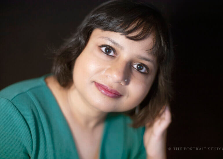 picture of a woman with a green shirt